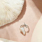 close up of natural keshi baroque pearl texture and sharp open silver band of Loxun blade ring