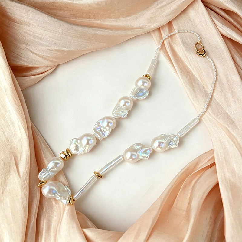 close up of natural keshi baroque pearl texture and gold silver mixed metal spacers on Loxun necklace