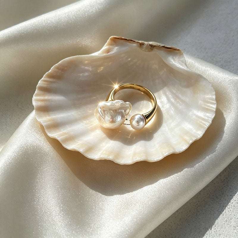 close up of Loxun open pearl ring showing adjustable band and natural baroque pearl texture