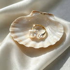 close up of Loxun open pearl ring showing adjustable band and natural baroque pearl texture