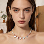 woman wearing Loxun custom letter necklace with pearl and pink tourmaline beads daily outfit