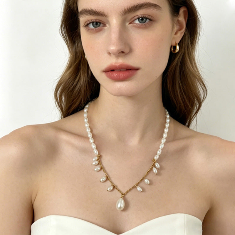 woman wearing Loxun french fairy pearl necklace tassel design 14k gold filled choker length