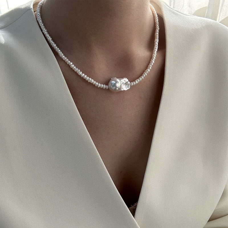 woman wearing Loxun layered pearl necklace center keshi baroque pearl on collarbone 38+5cm choker