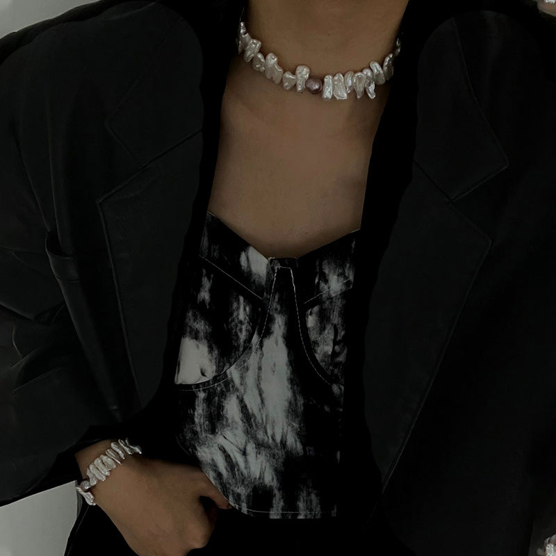 woman wearing Loxun sunflower pearl necklace baroque petal pearls adjustable choker length